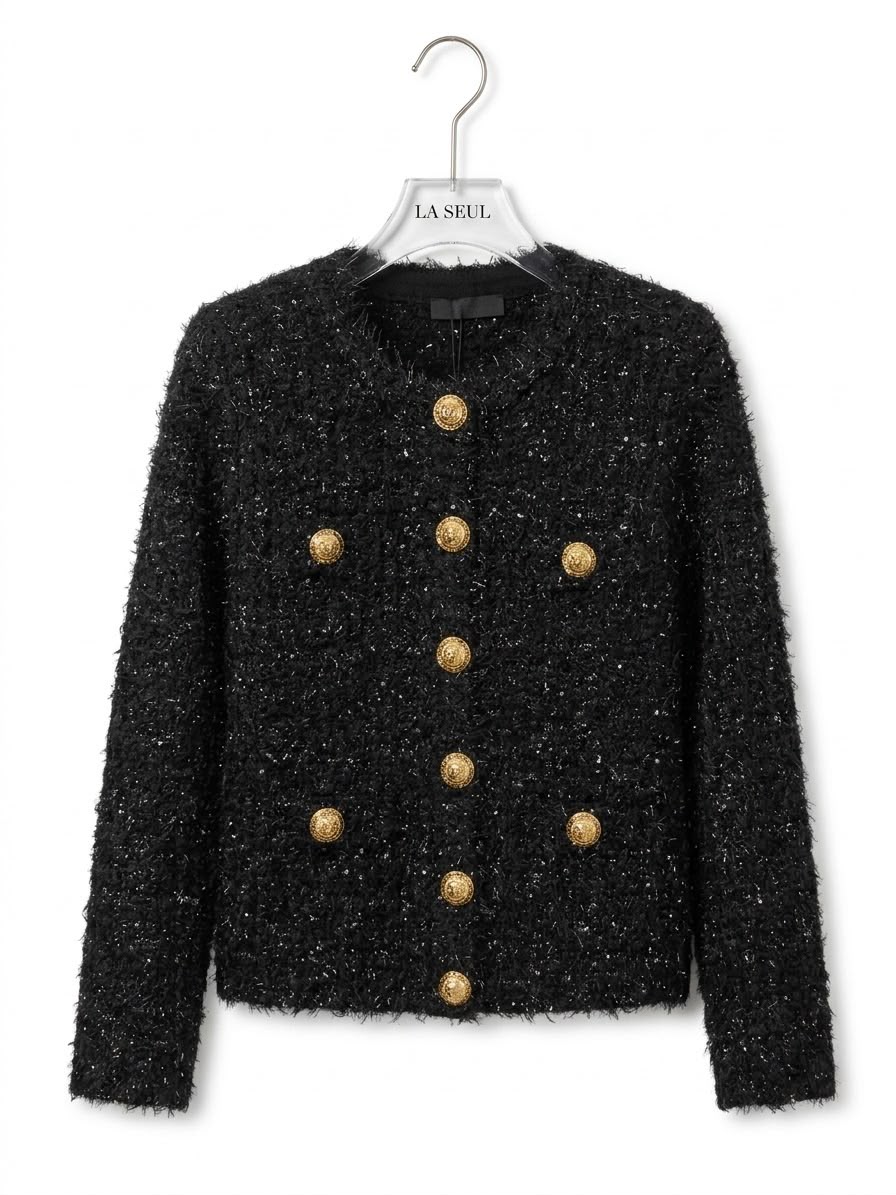 Black textured tweed jacket with subtle metallic threading and prominent gold buttons Balmain